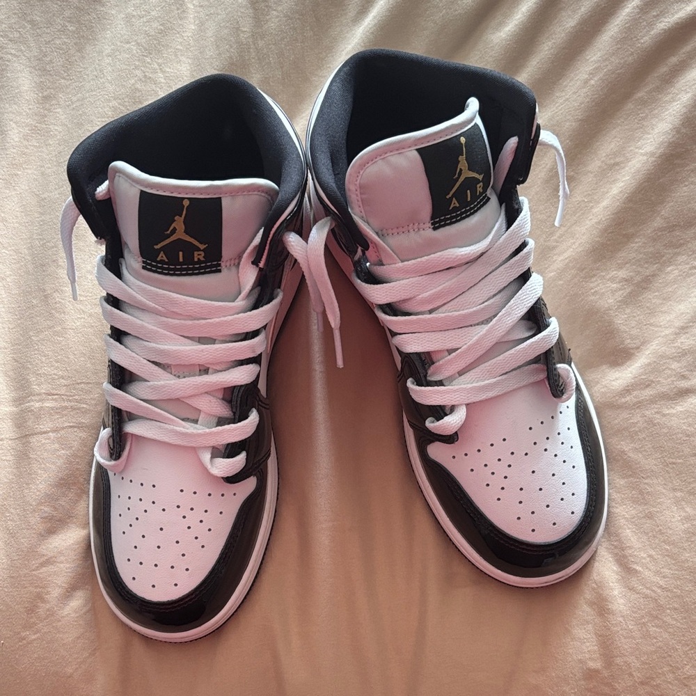 Nike Black and white with gold Air Jordon’s